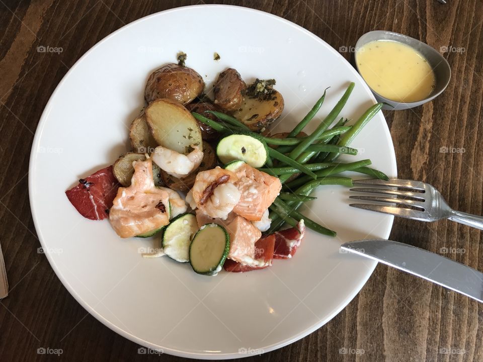 Grilled salmon and prawns with vegetable-a healthy meal