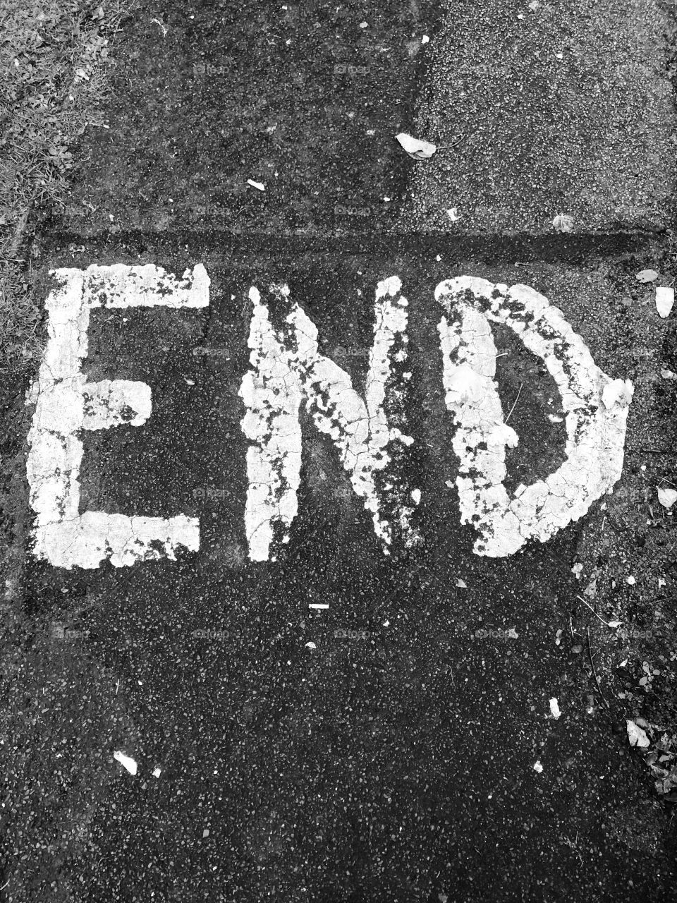 END painted on pavement 