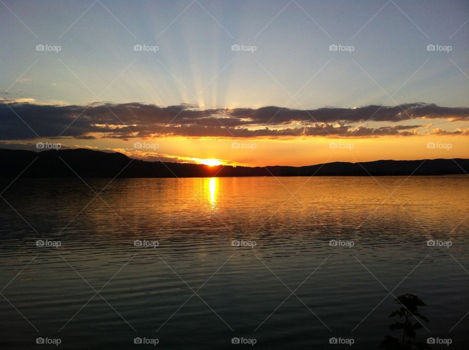 Scenic view of sunrise at lake