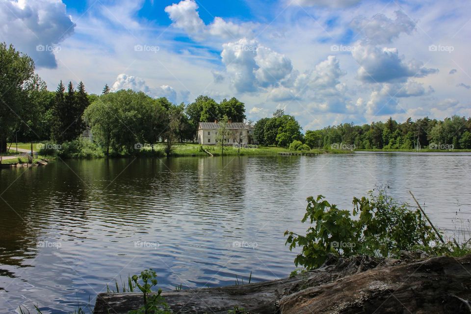 building on the shore of the lake in the village of Zhymaslavl