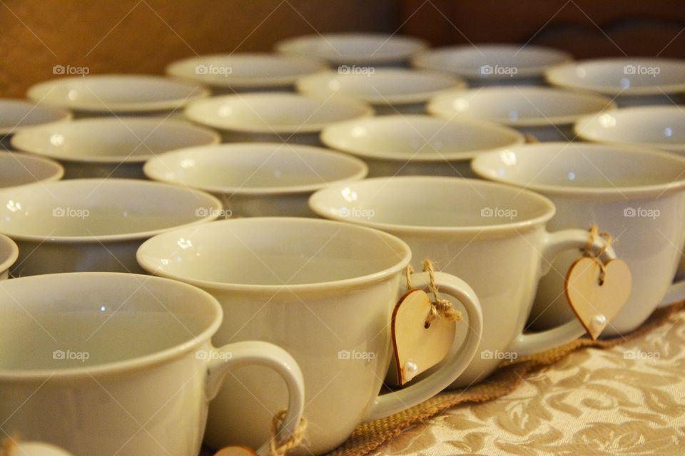 Group of tea cups with heart shape label