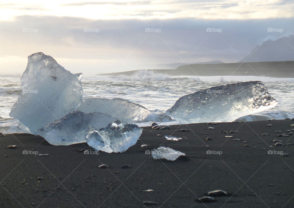 Amazing view of icebergs on the black sand beach, Iceland