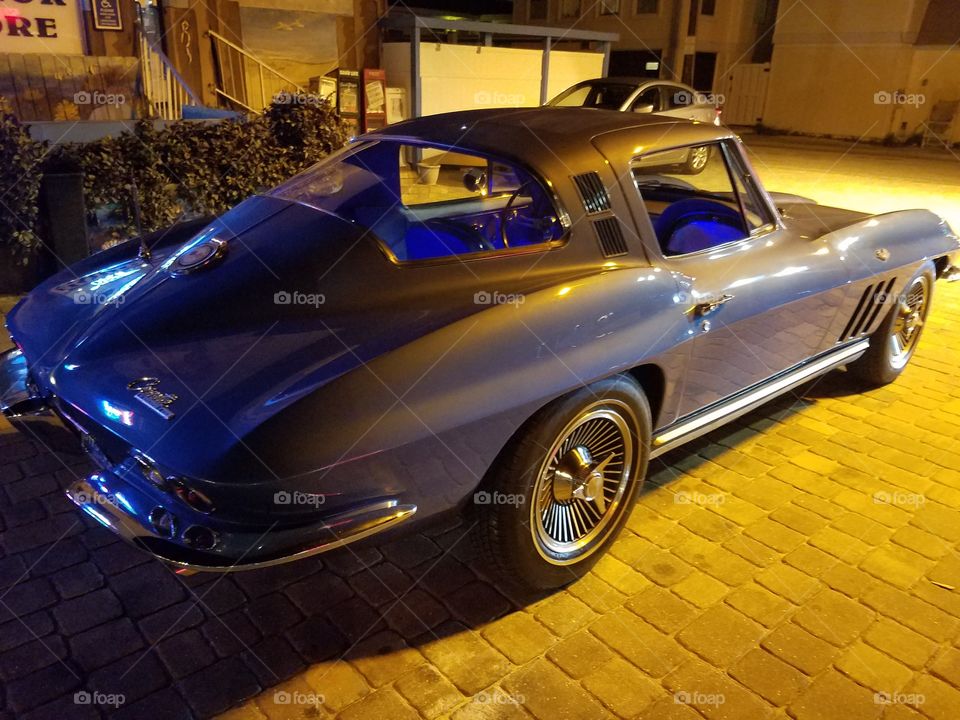beautiful old corvette in the still light of the beach