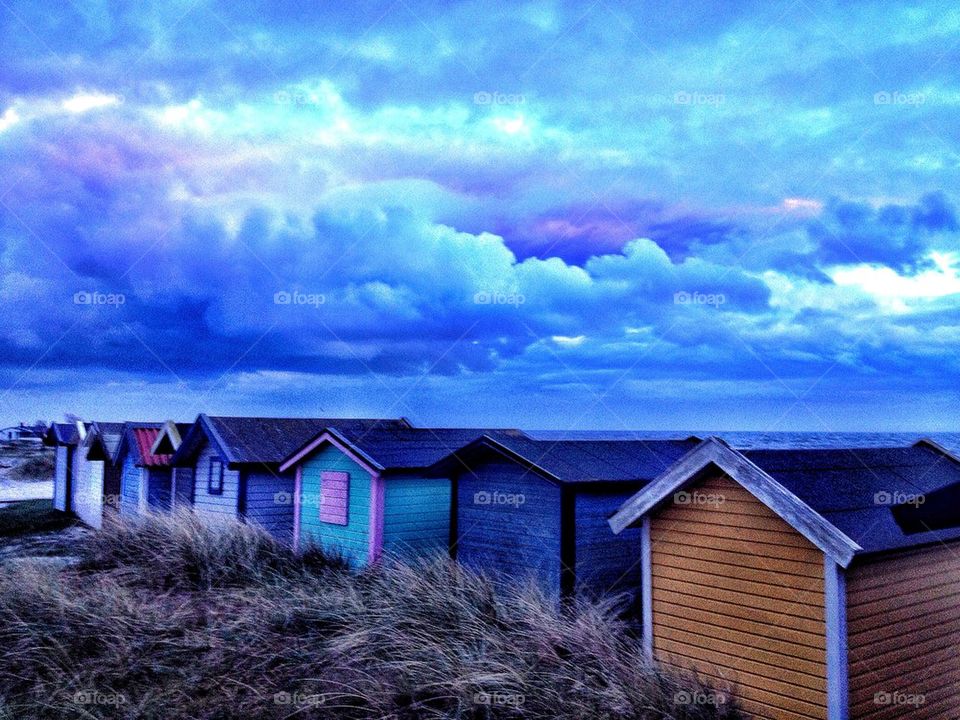 Beach huts in the clouds