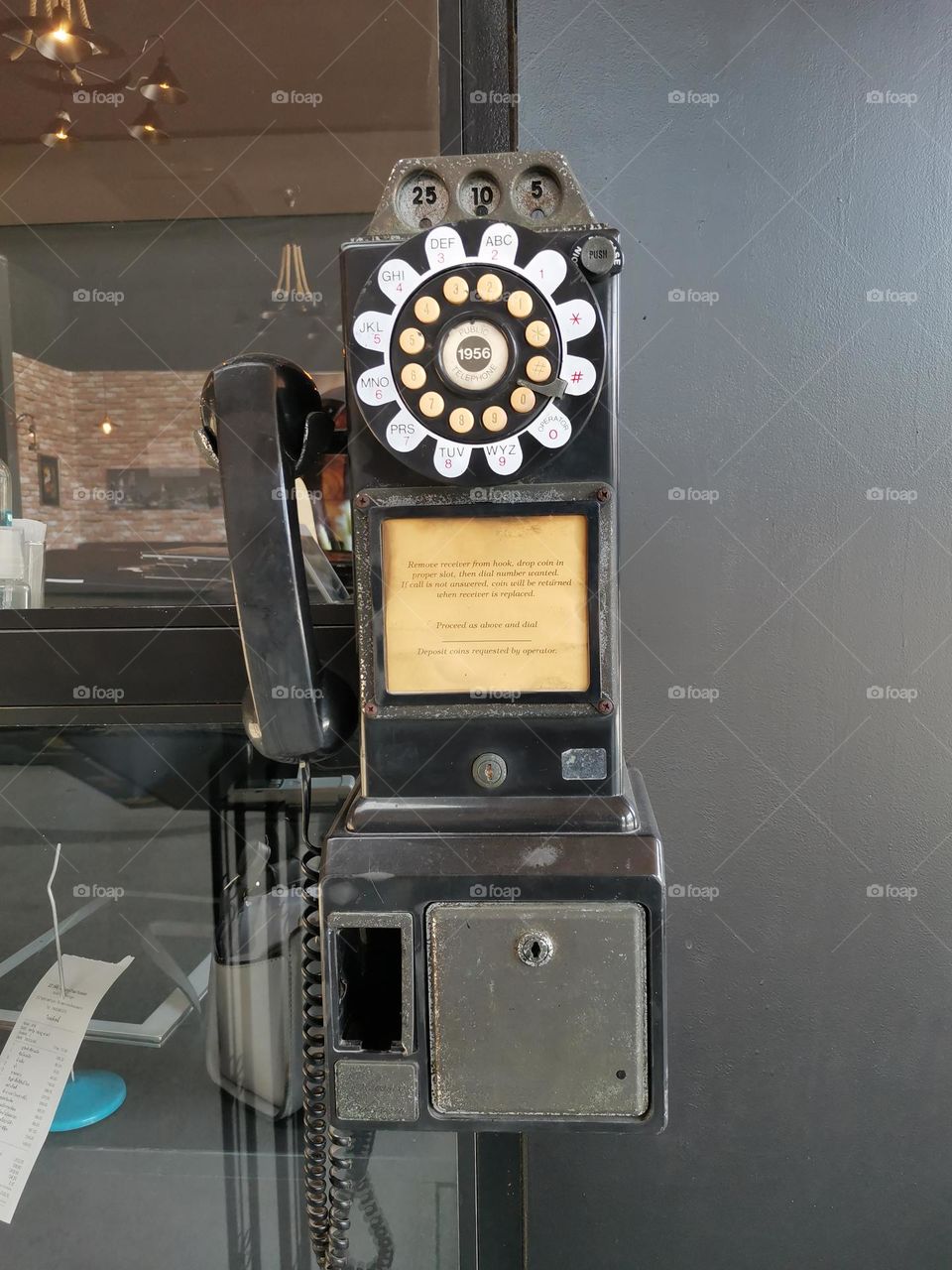 Antique Public Telephone on the Wall