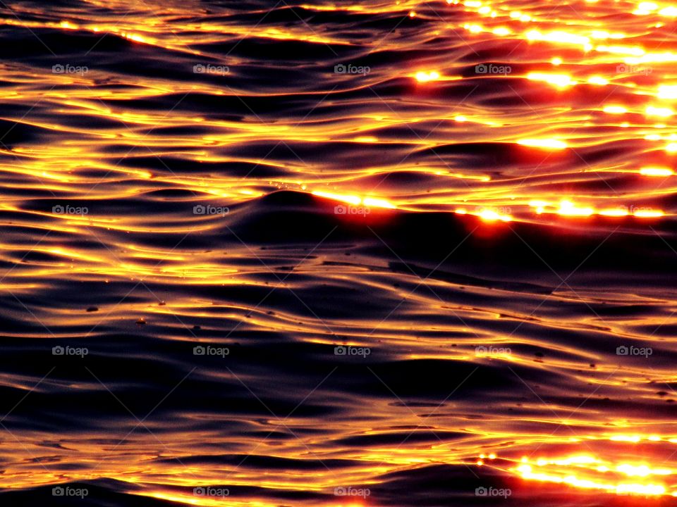 The sea at the sunset over Bagnoli ( Naples ).