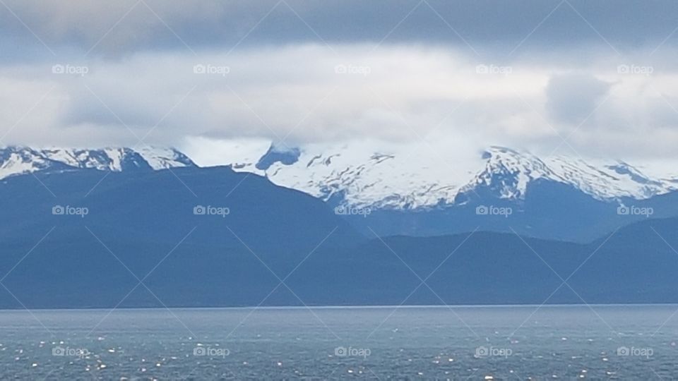mountains with snow and clouds in Alaska