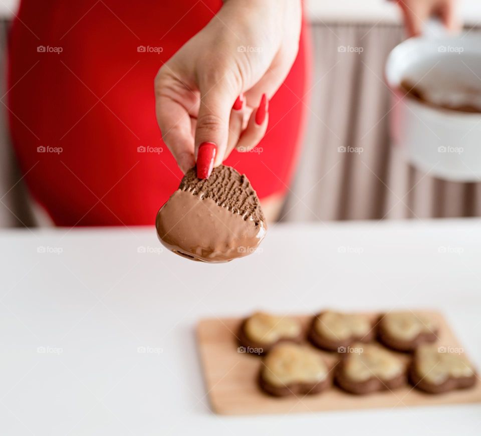 cooking heart shaped cookies at the kitchen