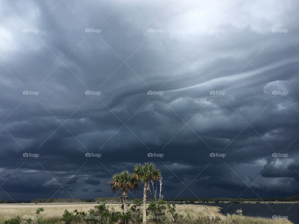 A storm line rolling into Bayport Pier, Florida.