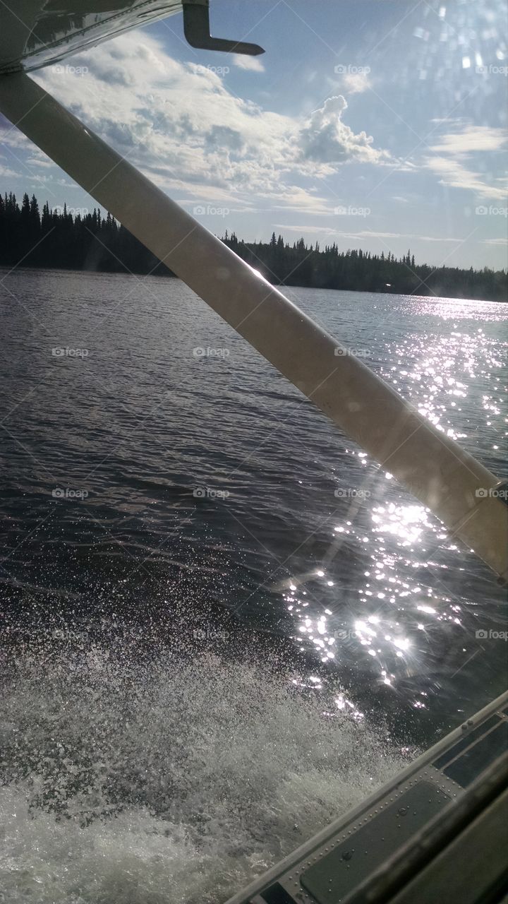 Float plane landing in the Wrangells