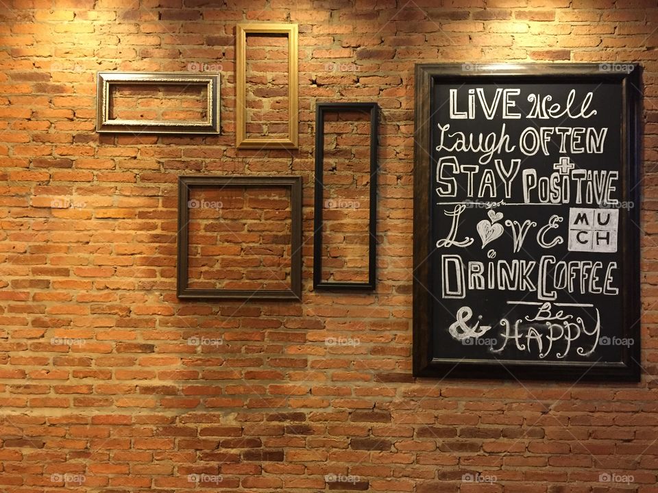 Chalkboard on abstract brick. Abstract brick wall background