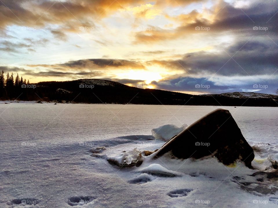 Sunset in snowy landscape 