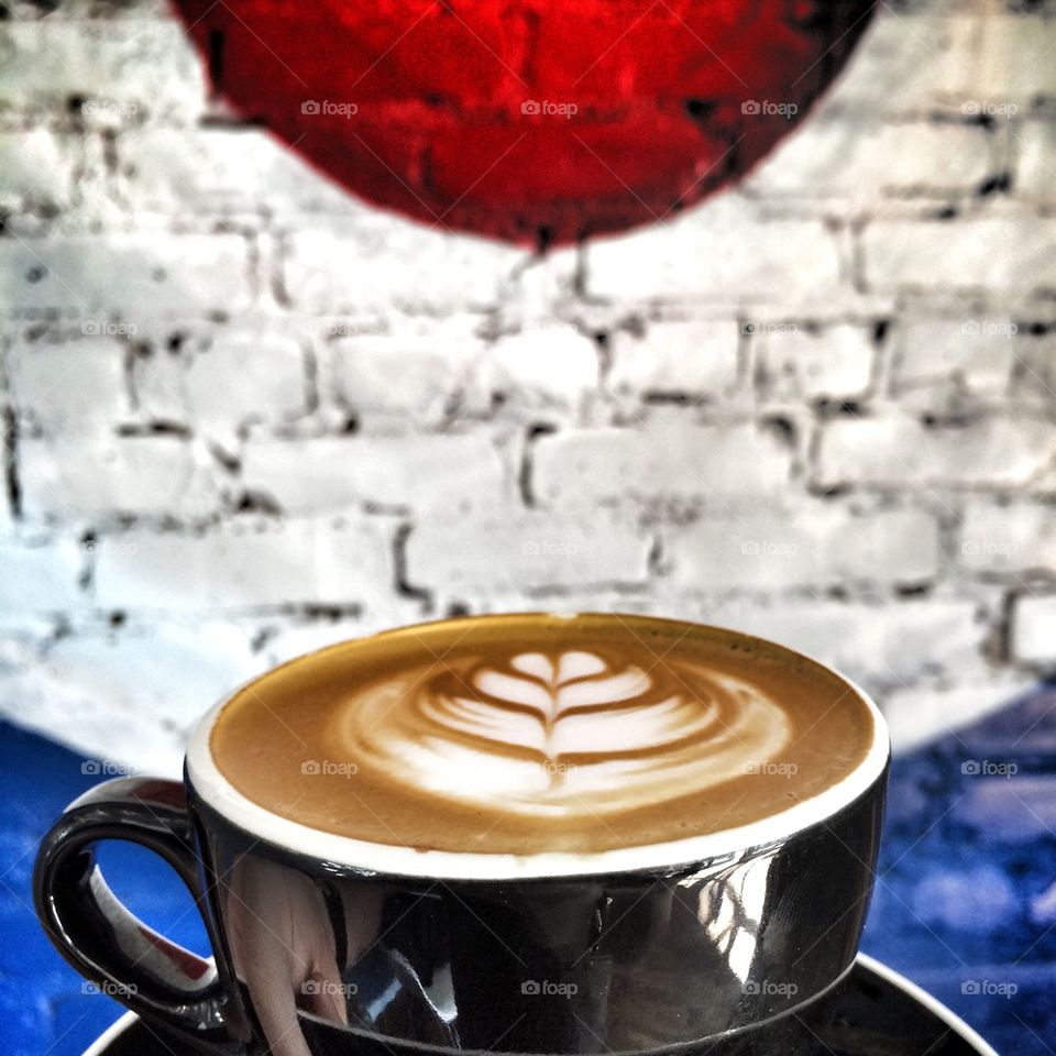 Close-up of coffee against wall