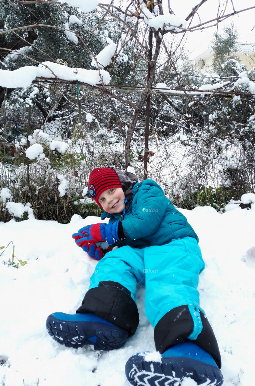 me laying in the snow