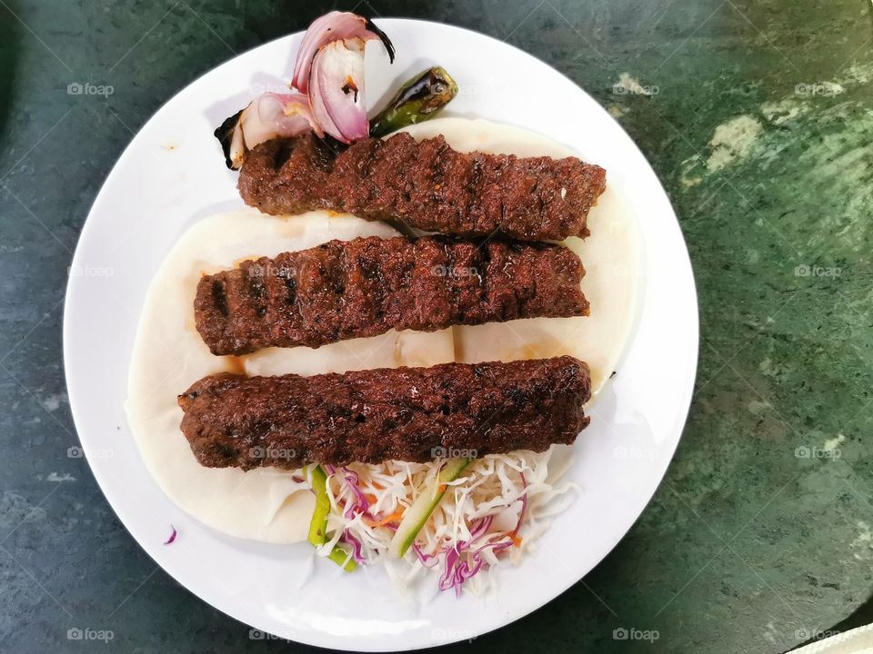 Beef Kebab with bread and salads