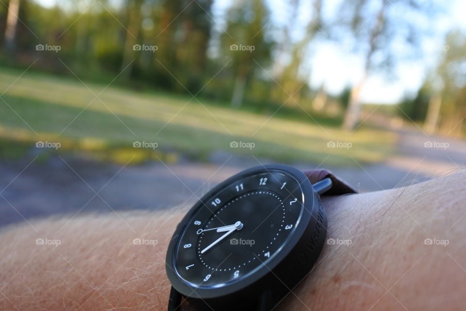 Watch on arm out in a park