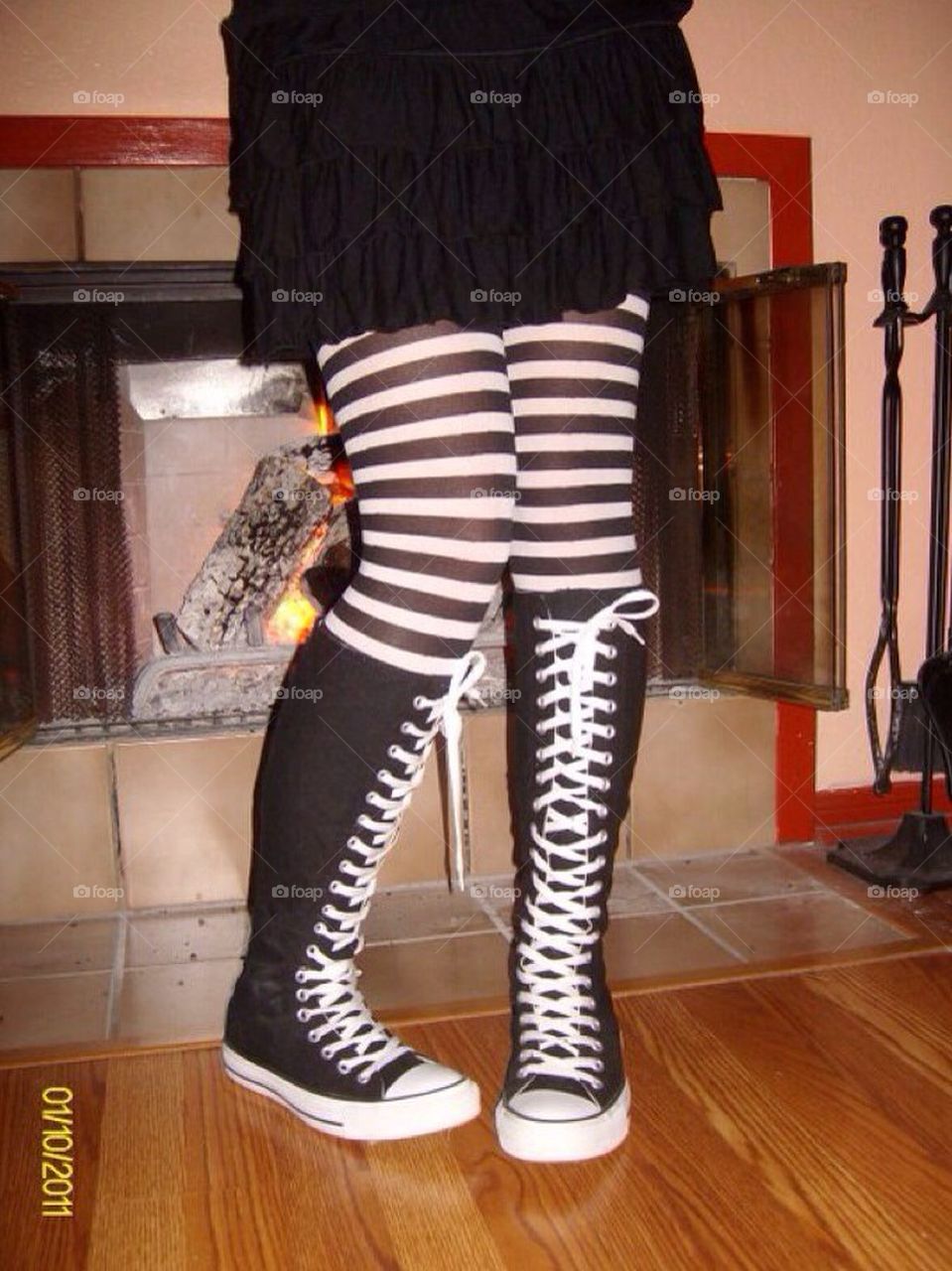 Knee boots. This tights reminds me either alice in wonderland or beetle juice.. My daughter dresses in her own unique and unoriginal