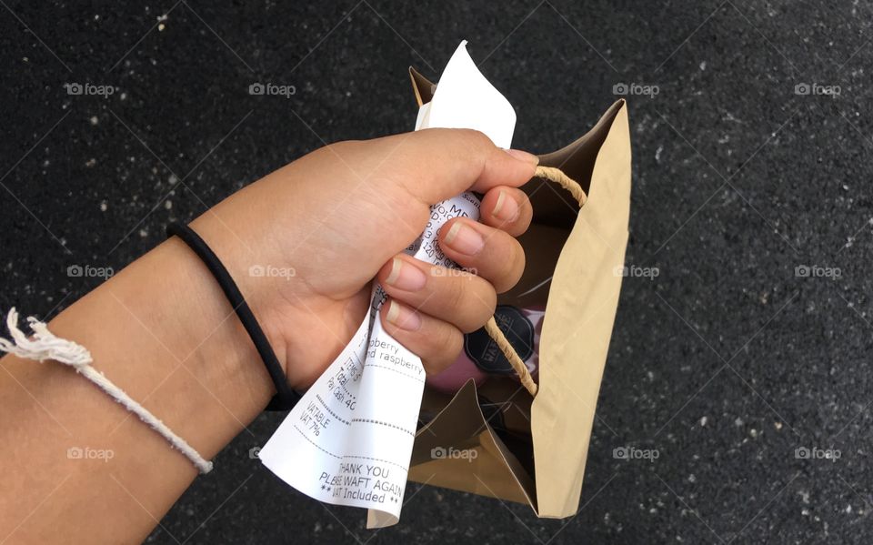 Holding something is.........