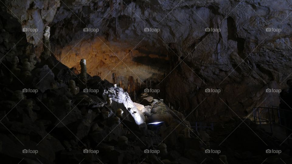 A dark underground cave in Romanian mountains