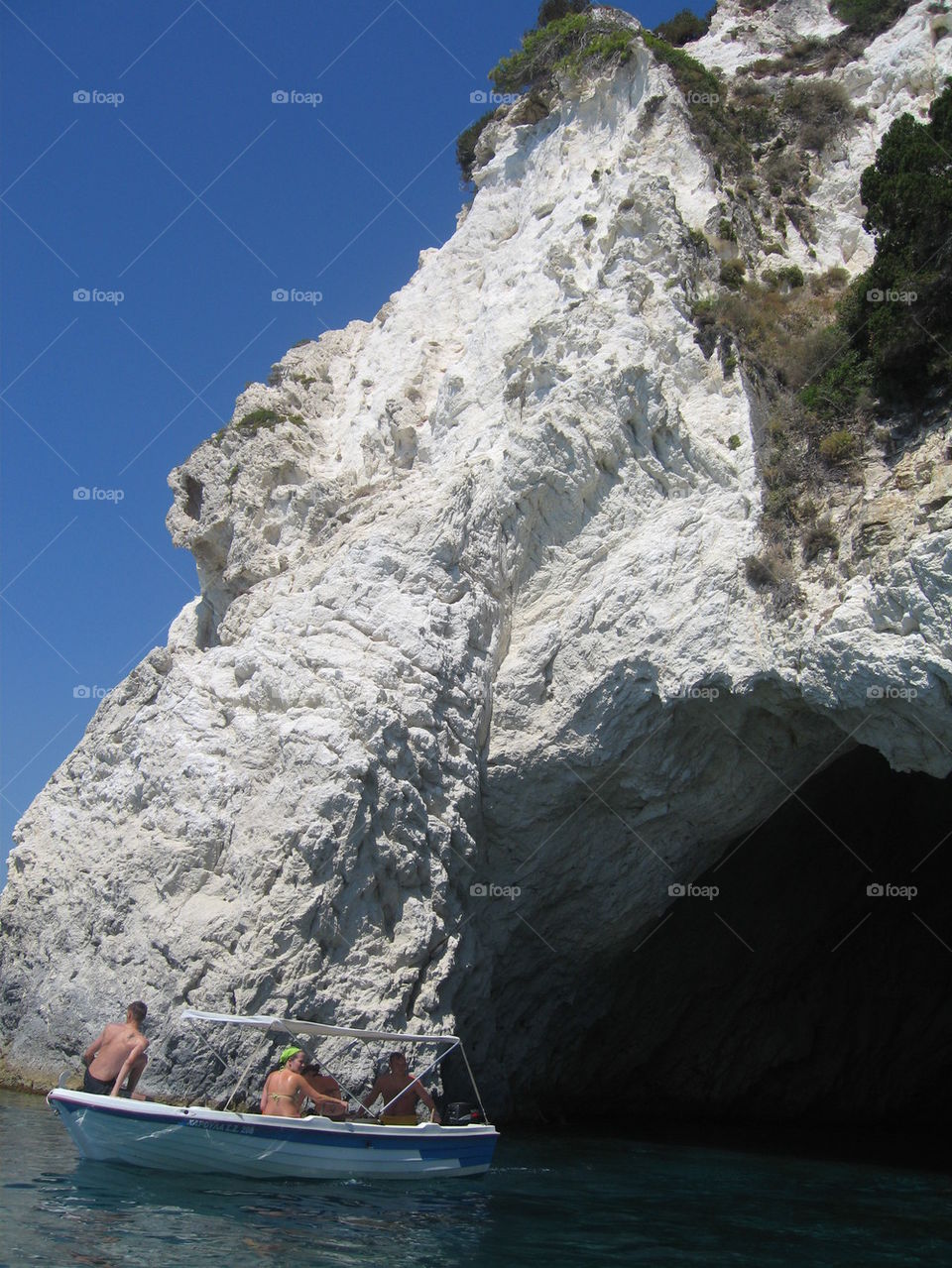 boat in front of cave