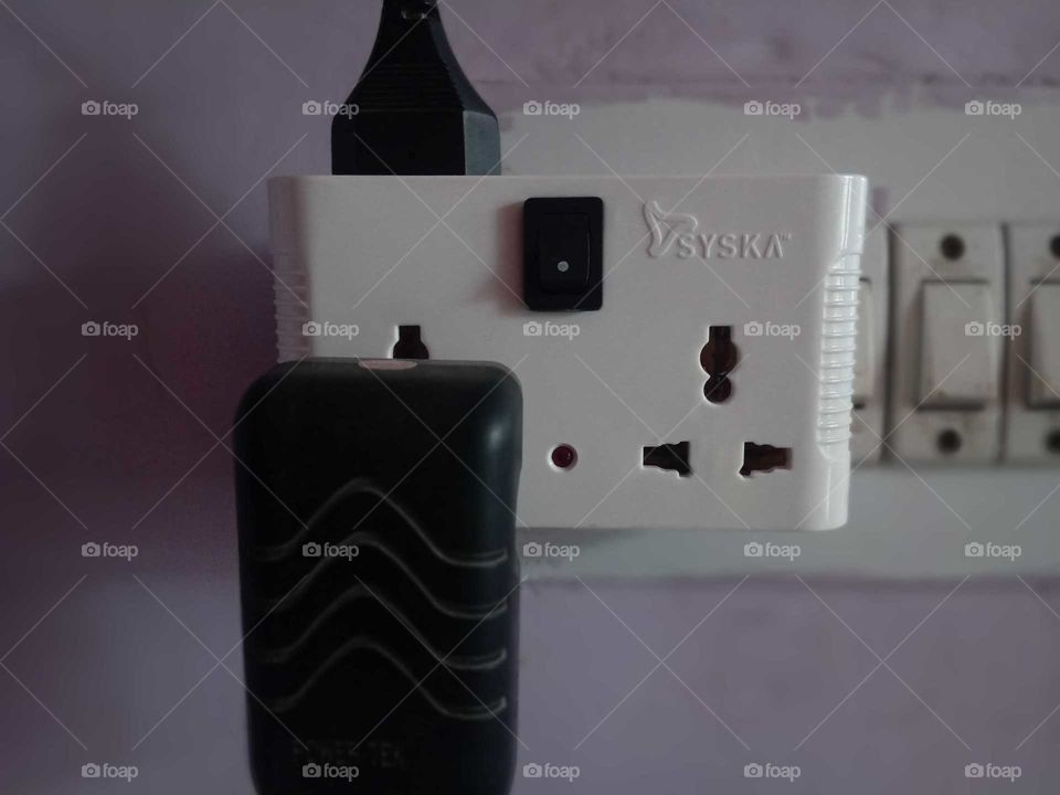 Syska plugs holder