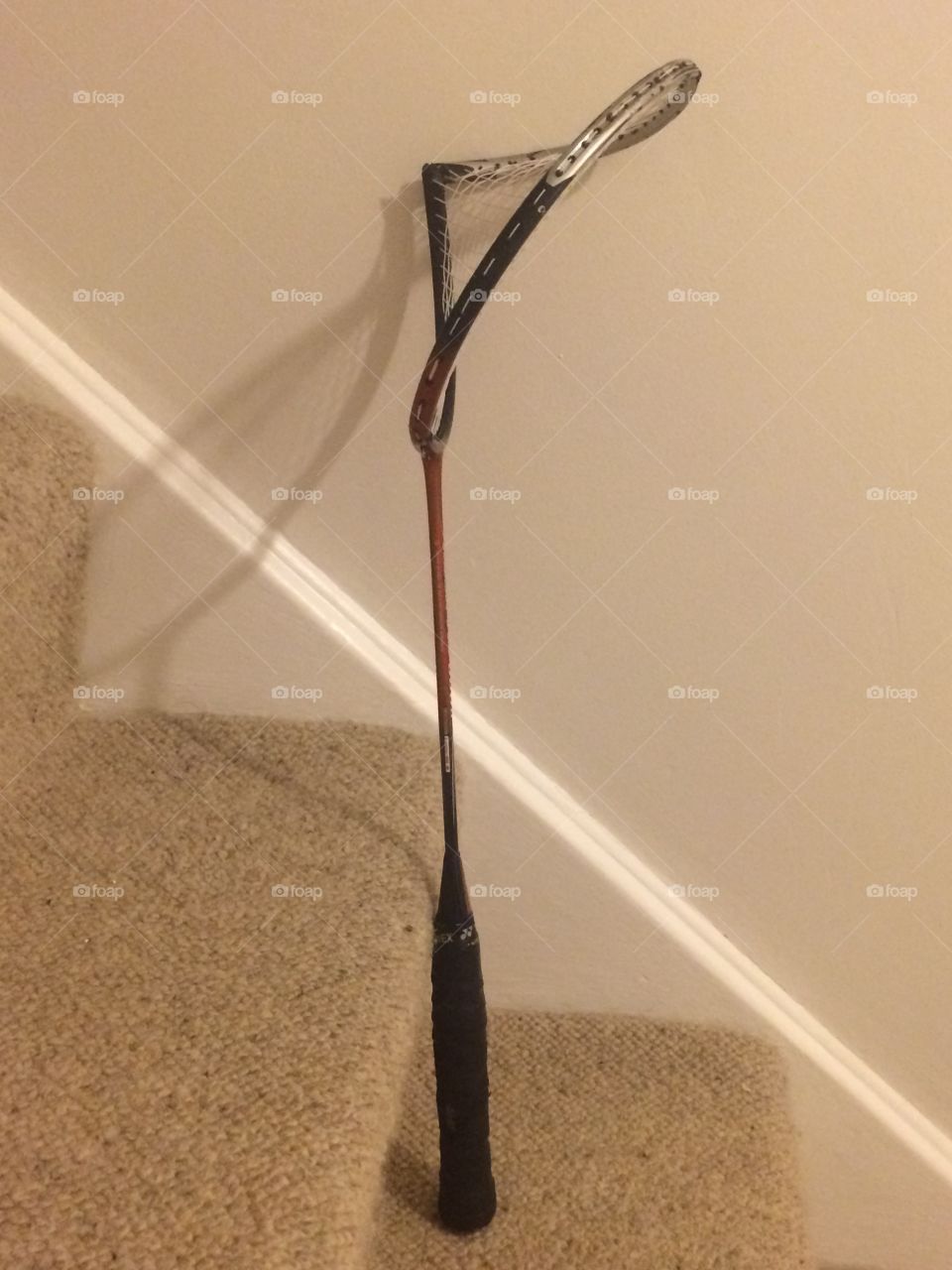 Broken badminton racquet frame