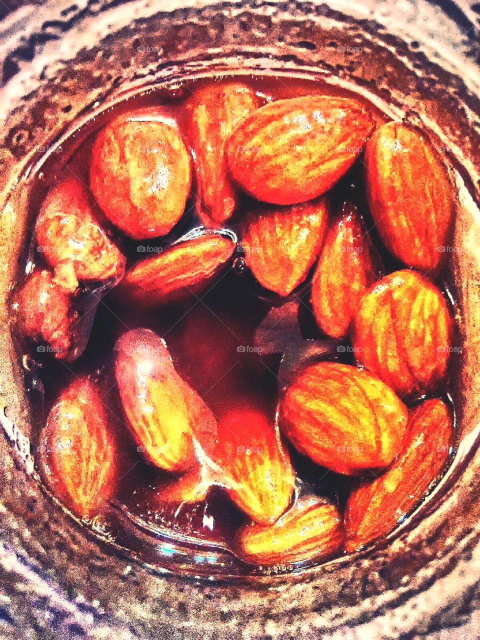 Healthy eating. Almond in honey. Yummy.