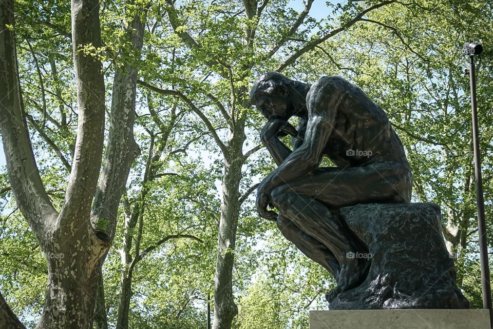 “The Thinker” by Auguste Rodin