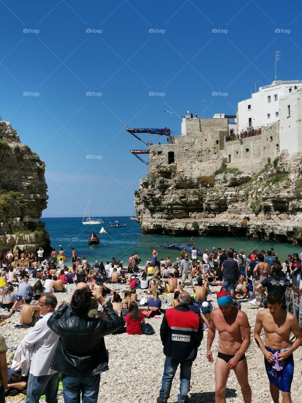 Summer time. Sea and many people on the beach. Crowd.