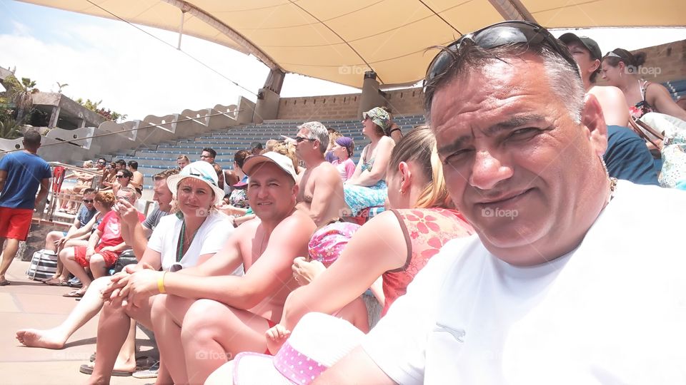 Group of people sitting in stadium