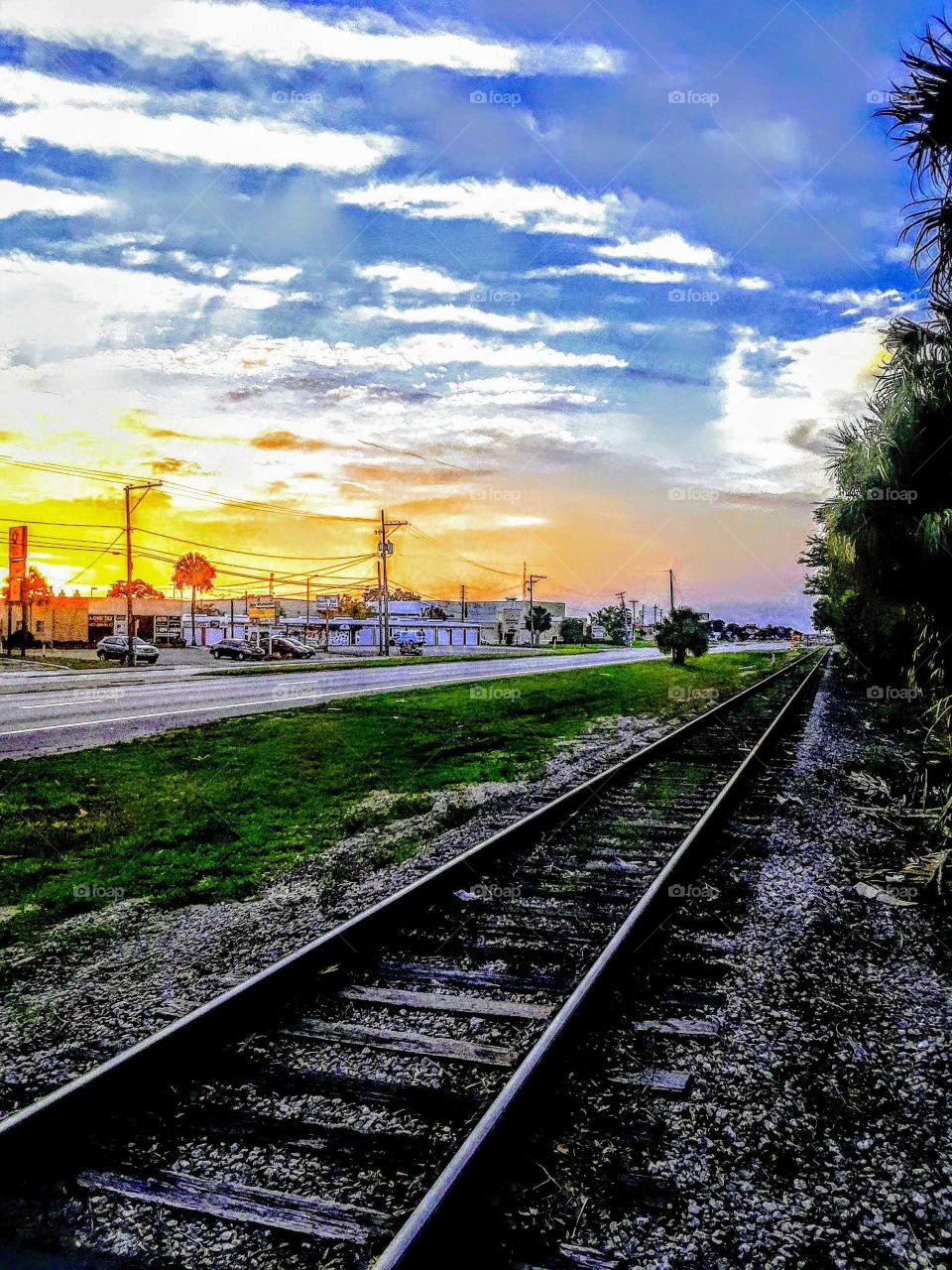 train tracks and gorgeous clouds.