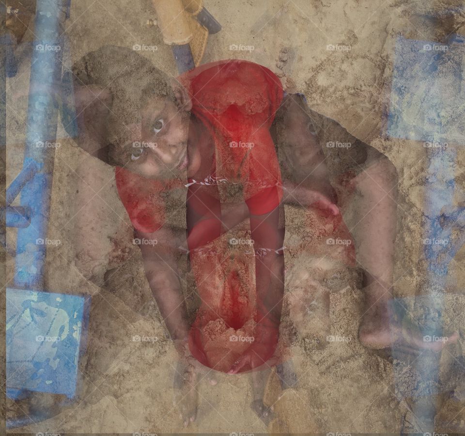 Boy playing in the sand, processed with double exposures 