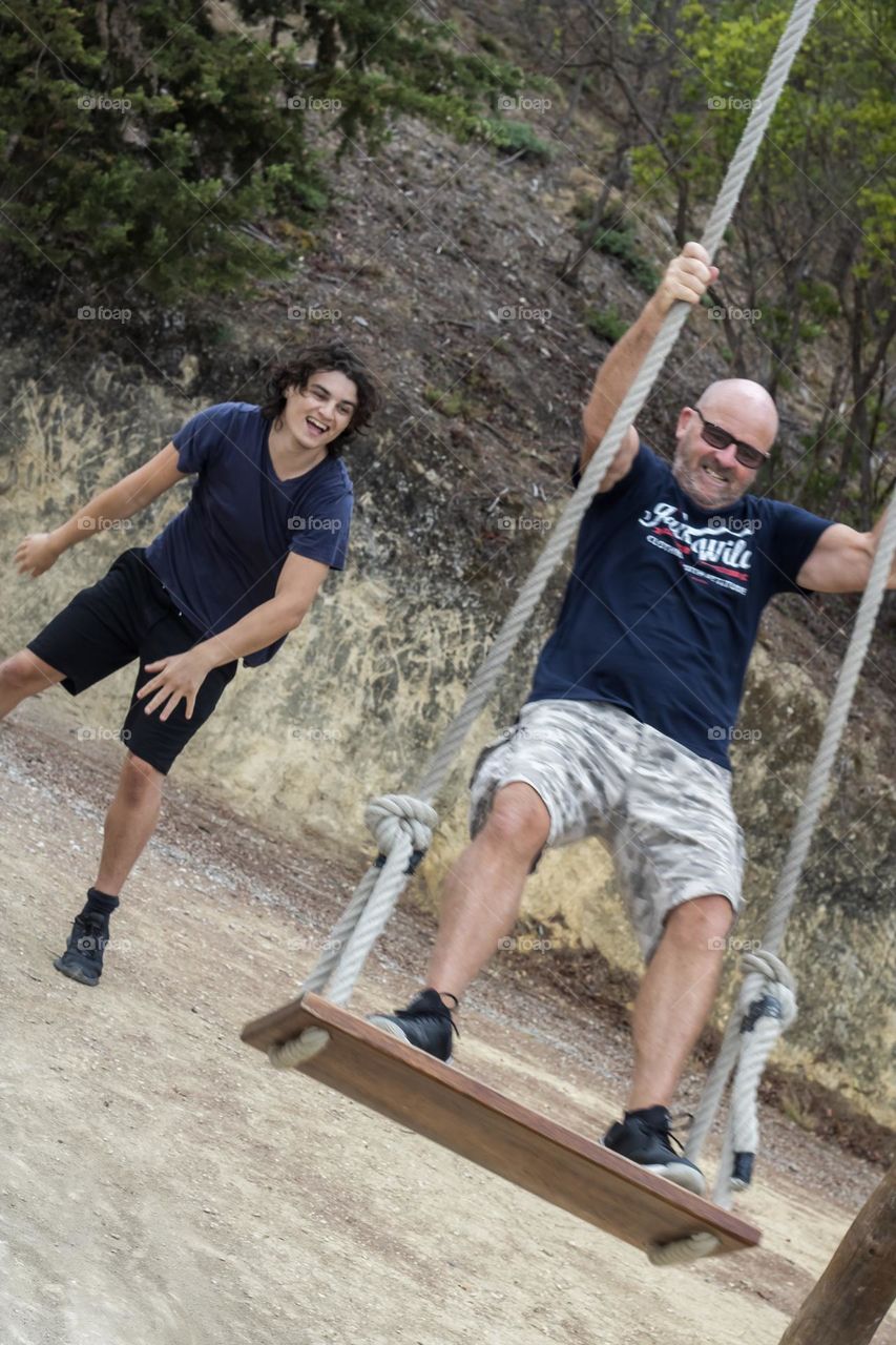 Fatherhood = Your adult children pushing you on the swing