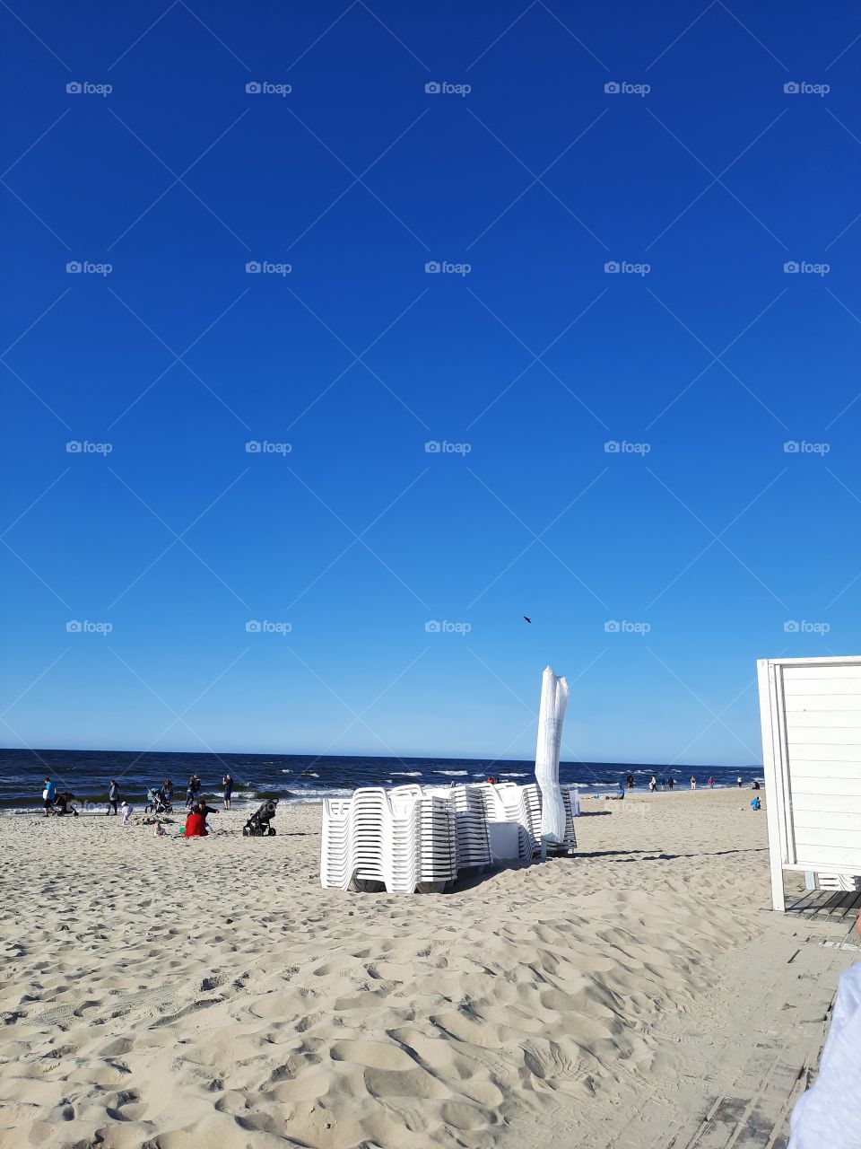 late afternoon at the beach  with blue sky