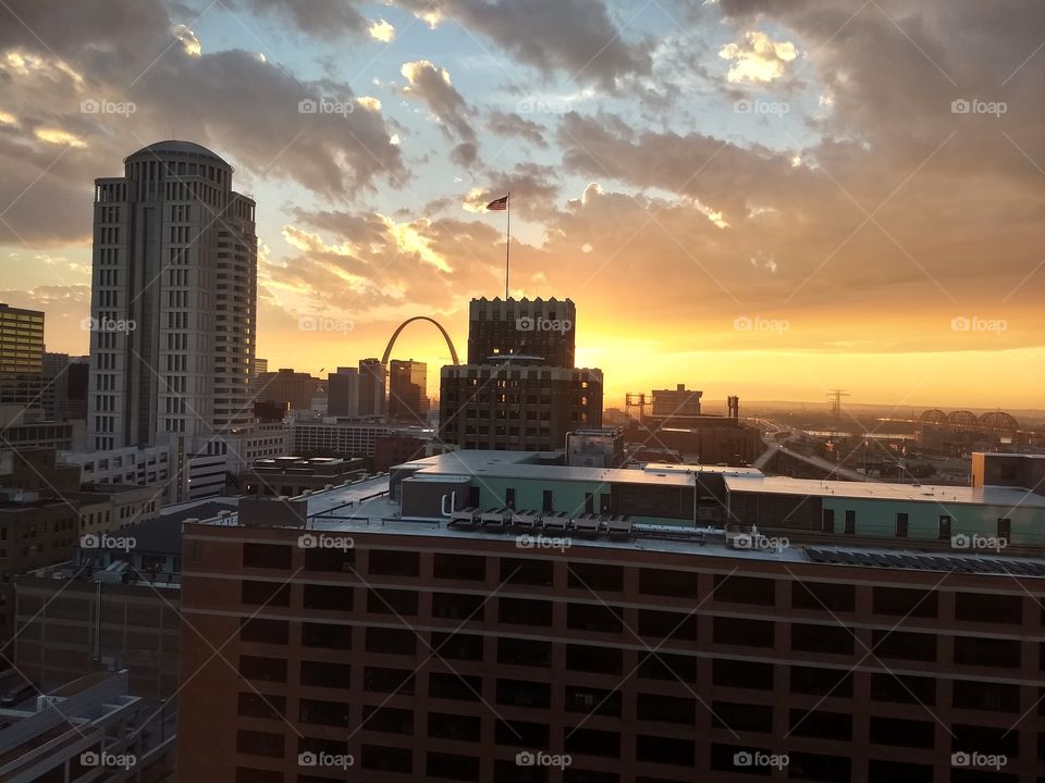 Sunrise over downtown St. Louis MO the arch visible in the background