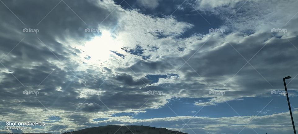 It's been said that clouds weigh over a million pounds yet they carry themselves to the world as if they were light as a feather...much like the strength we carry within ourselves to achieve greatness.