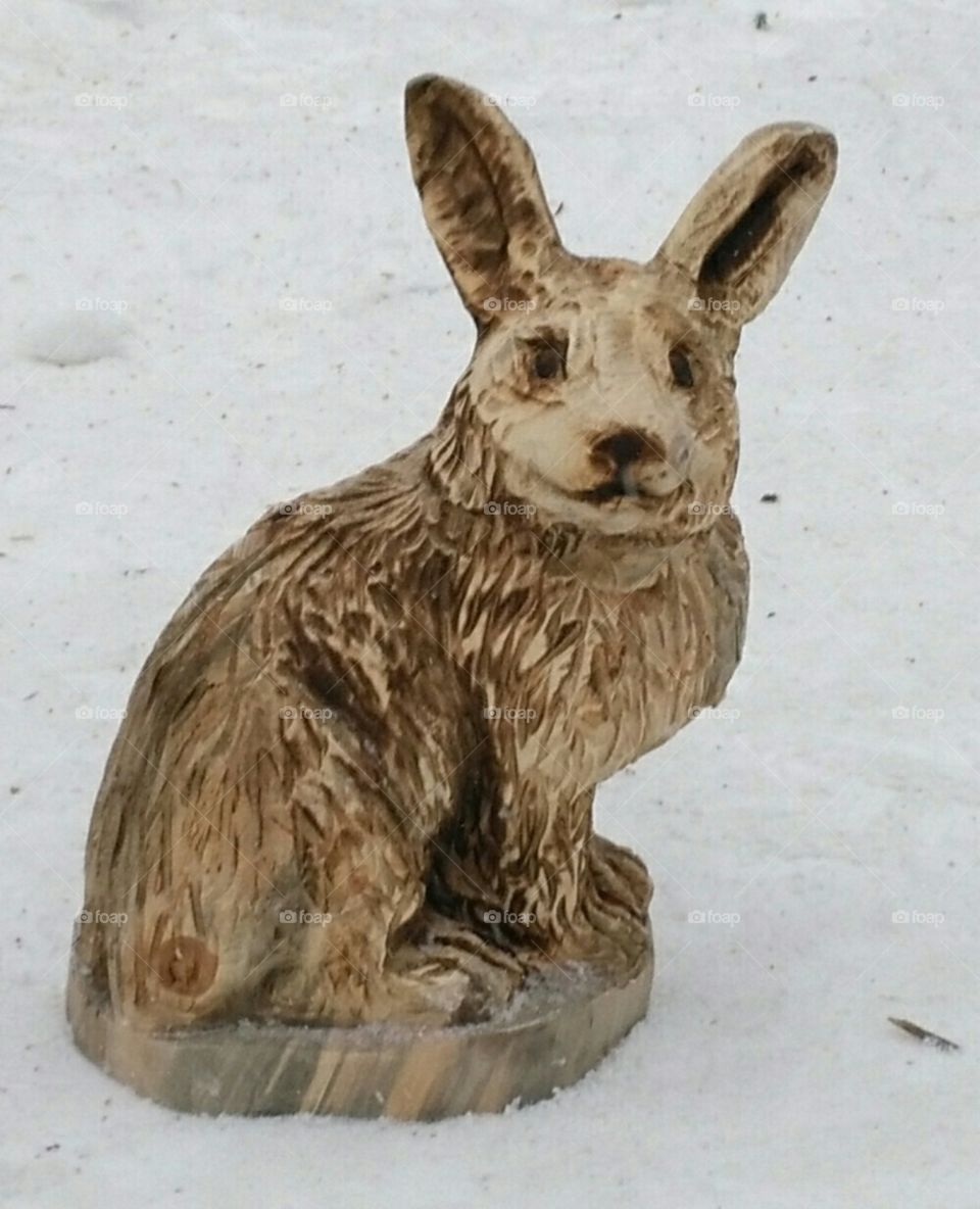 beautiful wood carving of a bunny