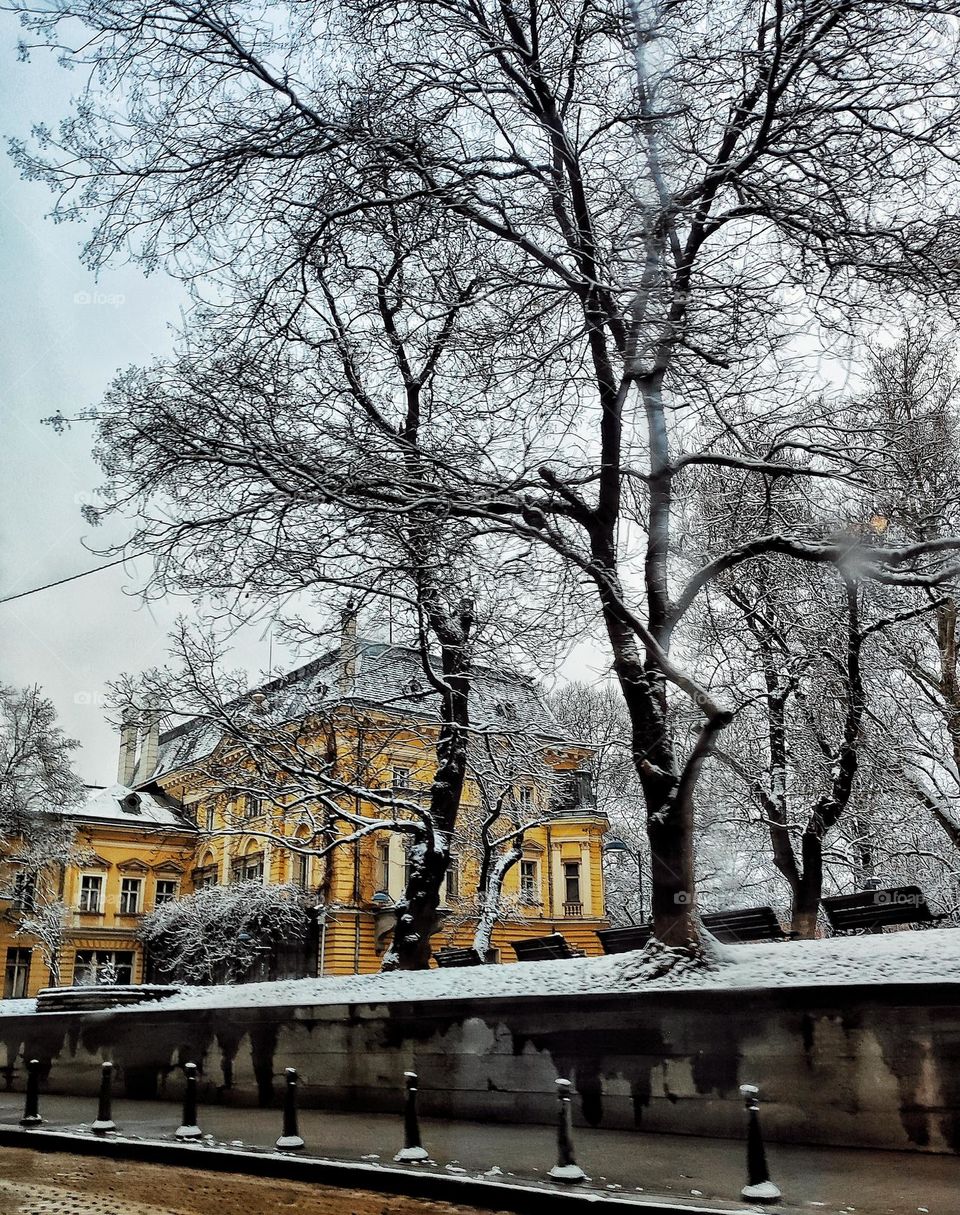 A beautiful scenery in the centre of the capital city of Bulgaria in the cold winter with amazing buildings, colours and snow