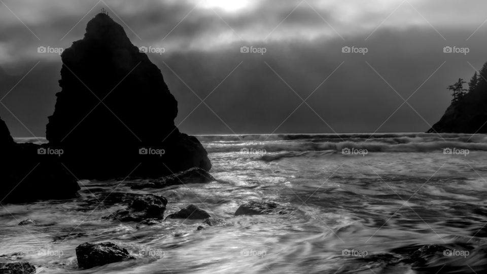 Rock at stormy sea