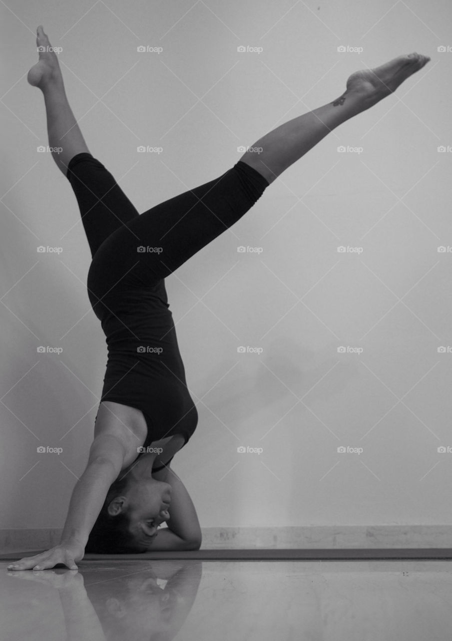 Yoga pose. Tripod headstand variation