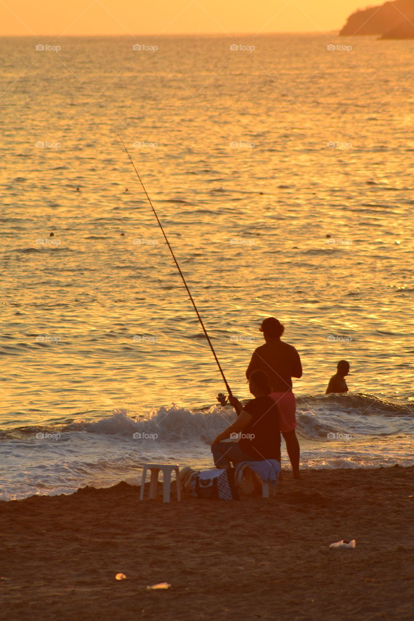 fishing on the beach in Alanya turkey with a rod