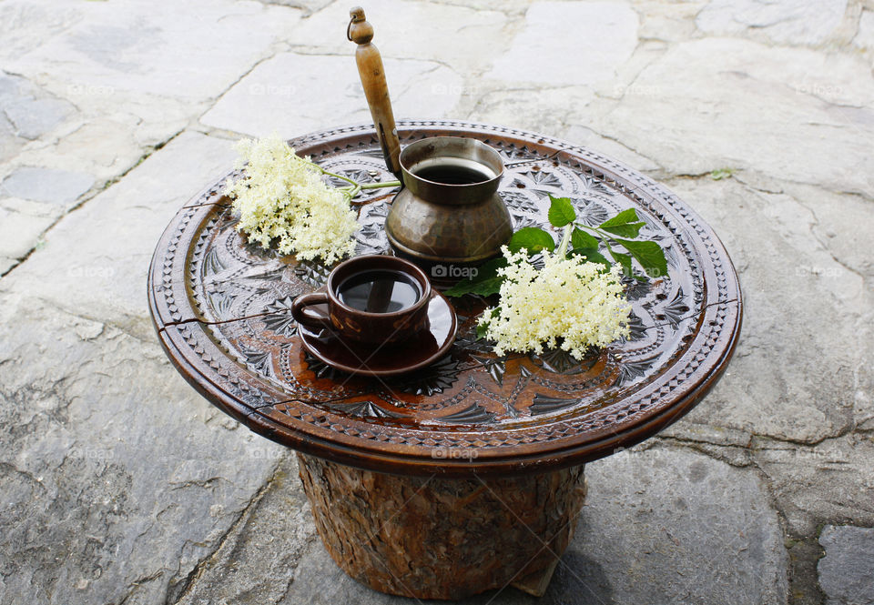 Wood-carved table and coffee