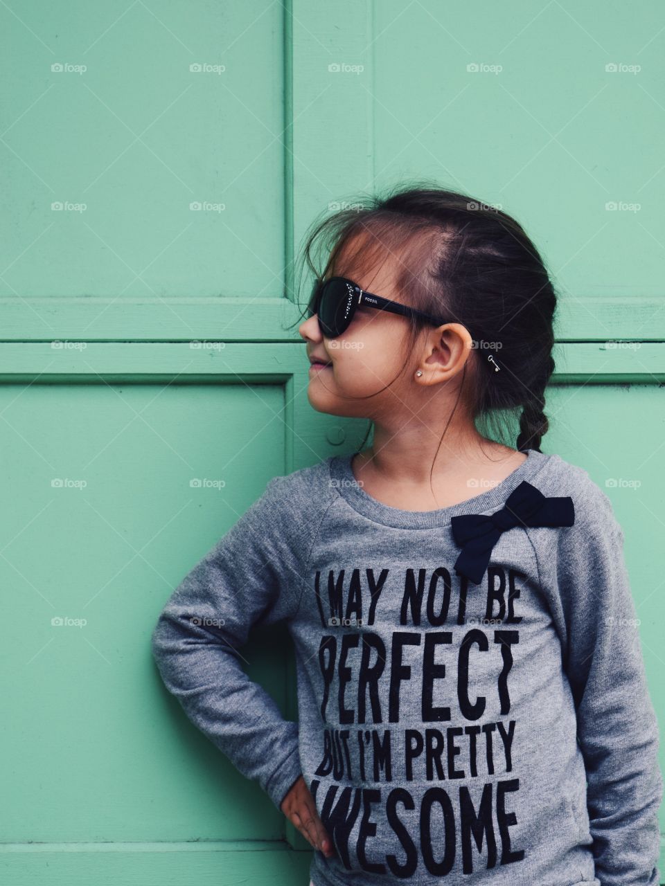 Close-up of a small girl with eyeglasses