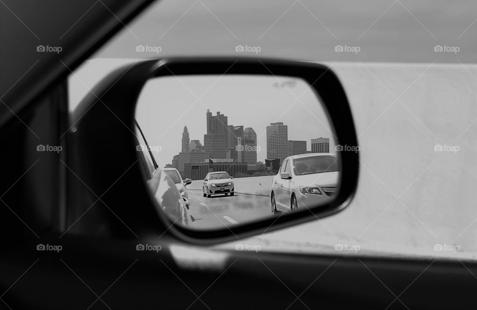 City in the rear view mirror