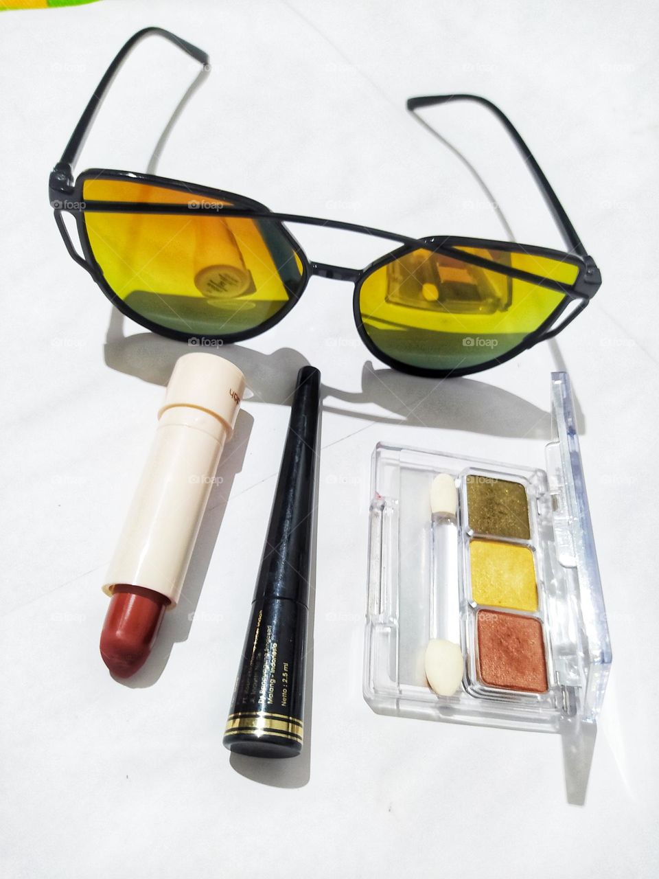 Sunglasses, lipstick, eyeliner, eyeshadow, isolated on white background, makeup tools