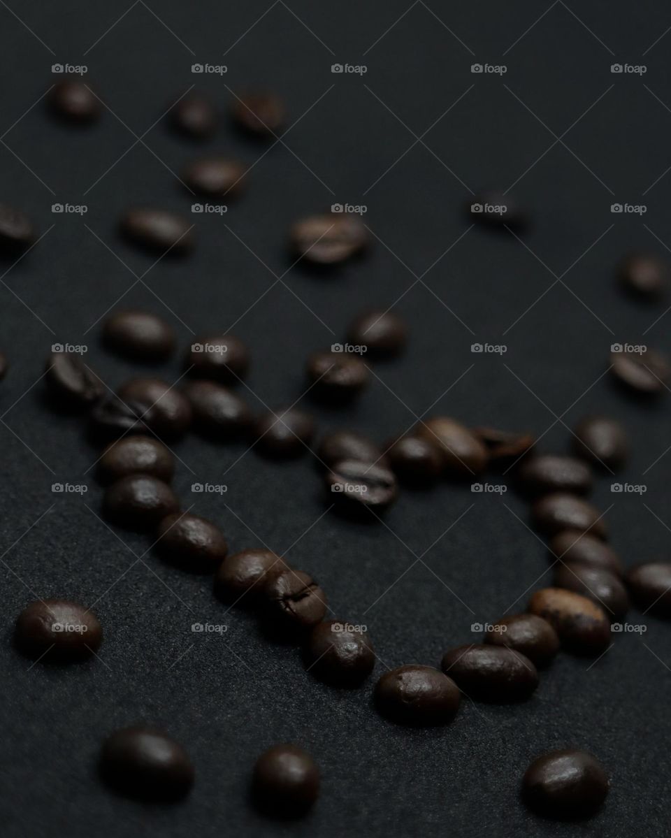 coffee beans on black background