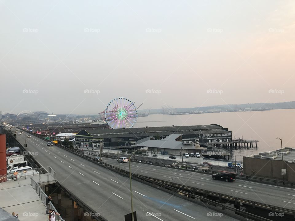 Seattle sunset, water front, amazing view. Clear sky, Ferris wheel 