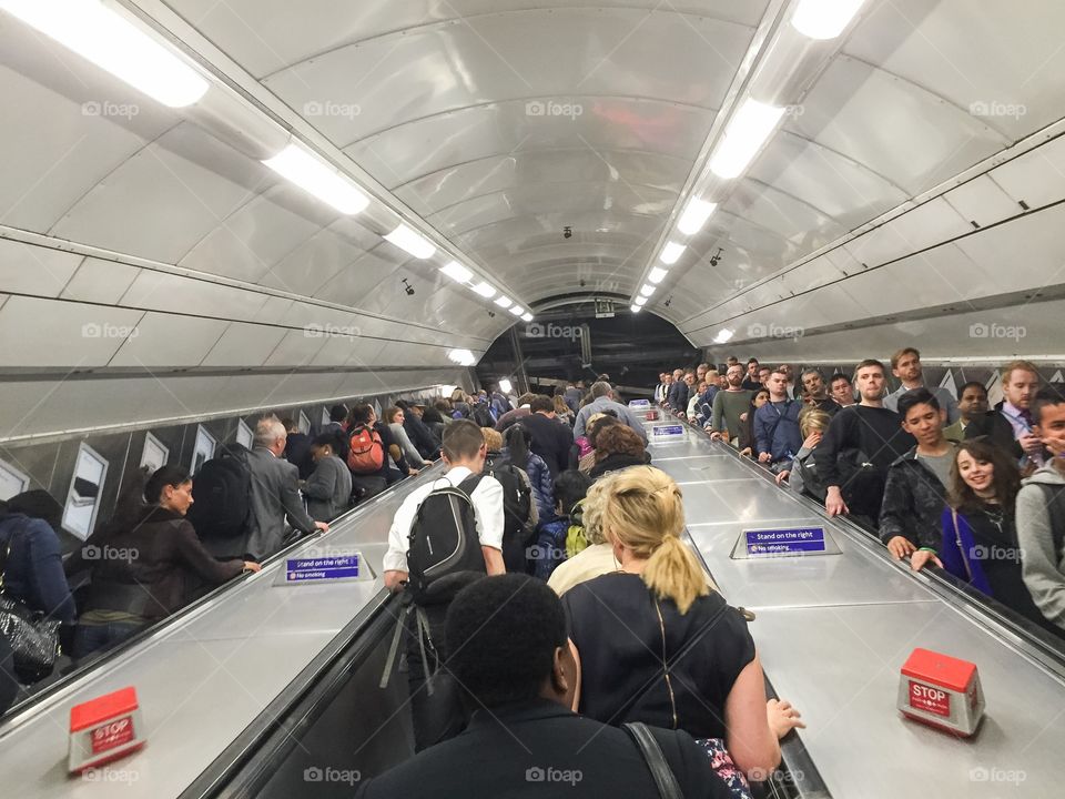 People in the London subway on her way home from work.