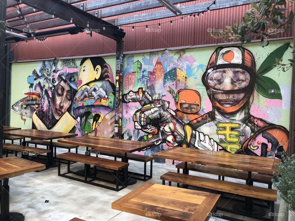 A portion of David Choe’s mural on the wall of David Chang’s restaurant near Chinatown in Los Angeles 