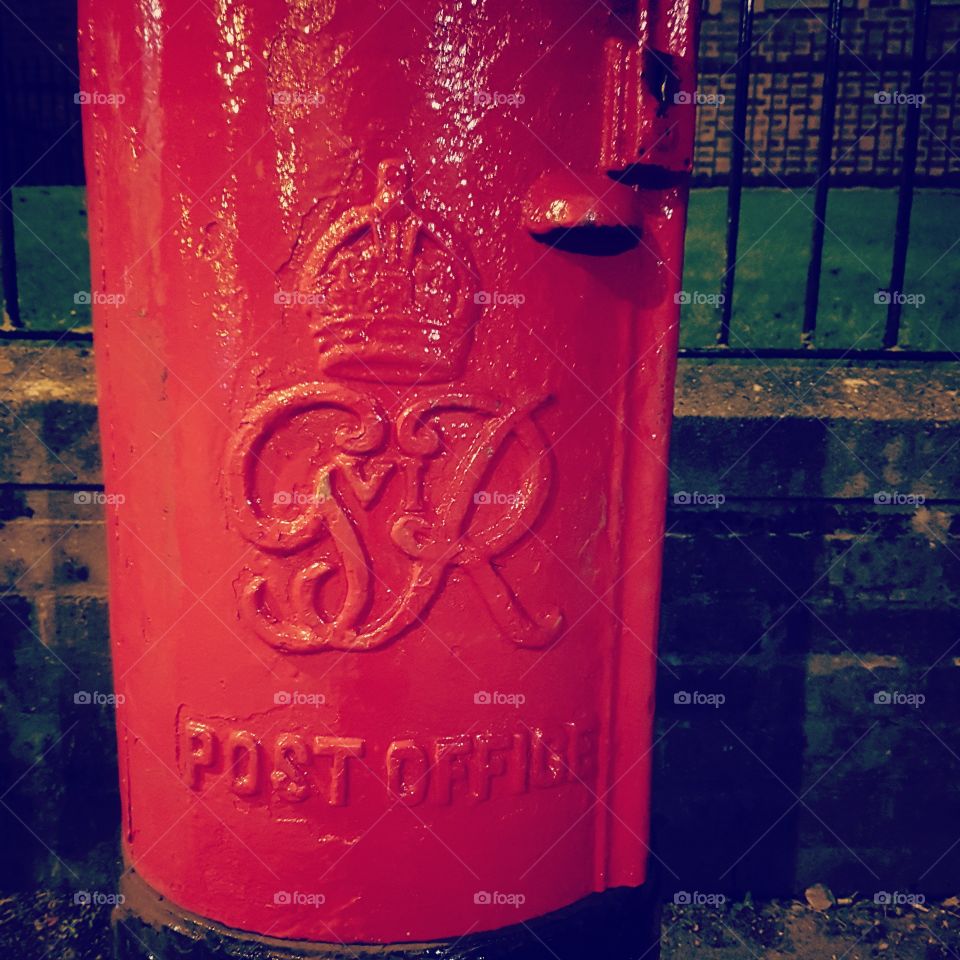 Red post box in Oxford. King George's